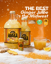 Load image into Gallery viewer, Premium Steeped Ginger Juice 64oz Bottle from Jake's StrongGinger™ with a steaming cup and fresh ginger.