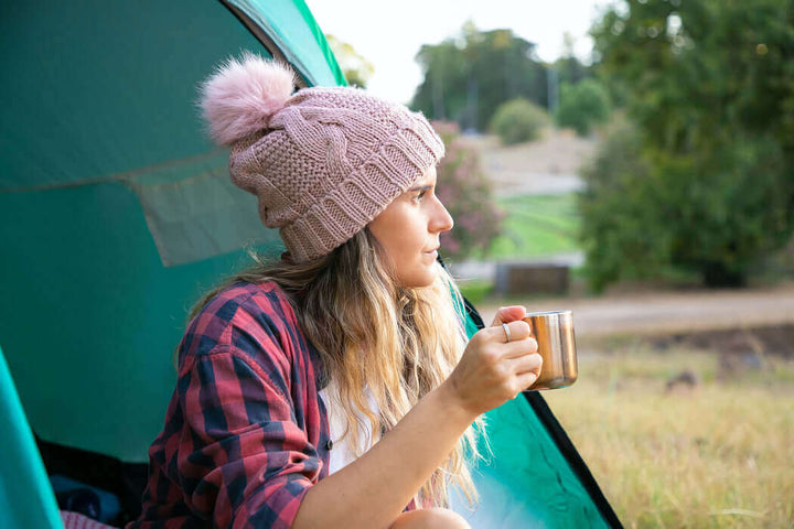Jake's StrongGinger organic ginger juice being enjoyed by a female camper fighting a cold