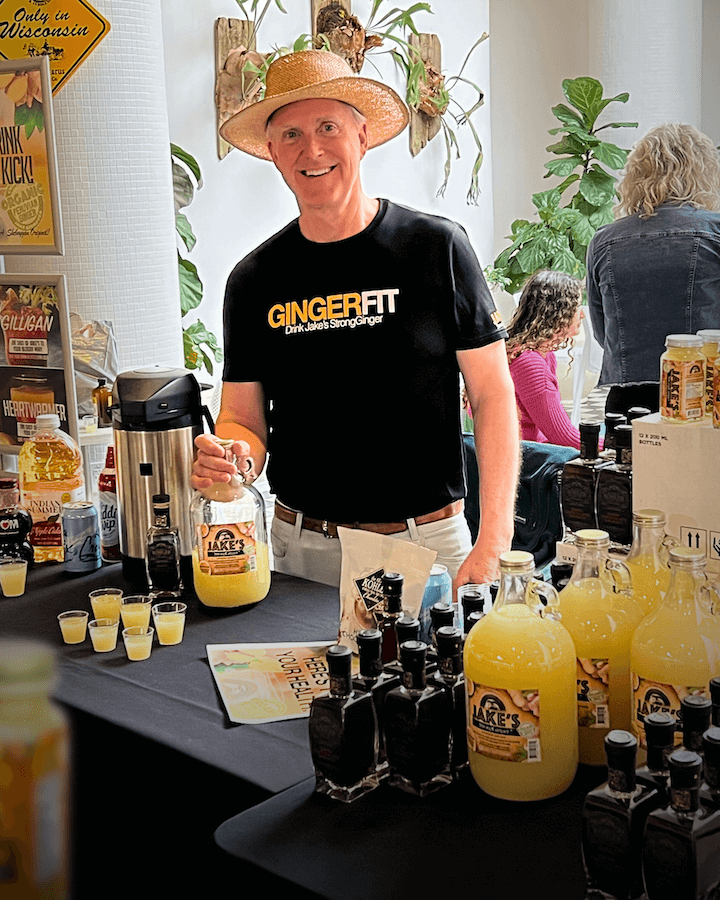 Tryg Jacobson selling Jake's StrongGinger organic ginger juice in store 