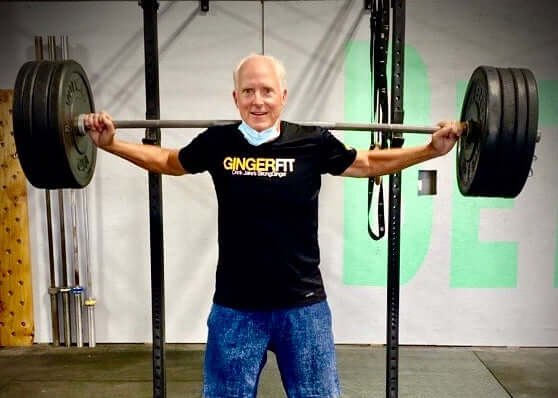 Tryg Jacobson drinks Jake's StrongGinger organic ginger juice and helps him when  lifting heavy barbells.