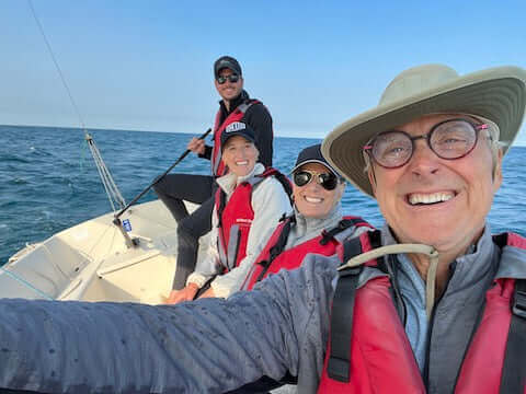 Jake and family in sailboat always bring Jake's StrongGinger organic ginger juice for nausea