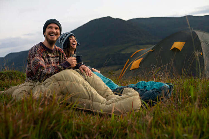 Jake's StrongGinger organic ginger juice is a great health drink for camping enjoyed by a couple in a tent