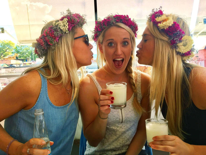 Three girls drinking Jake's StrongGinger organic ginger juice