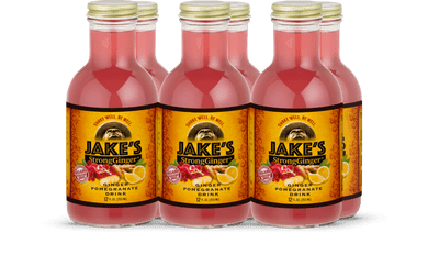 Jake's StrongGinger organic 12oz ginger pomegranate juice bottles in a 6 pack