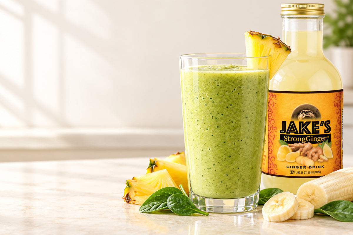 Pineapple, banana and spinach smoothie beside Jake’s StrongGinger organic ginger juice.